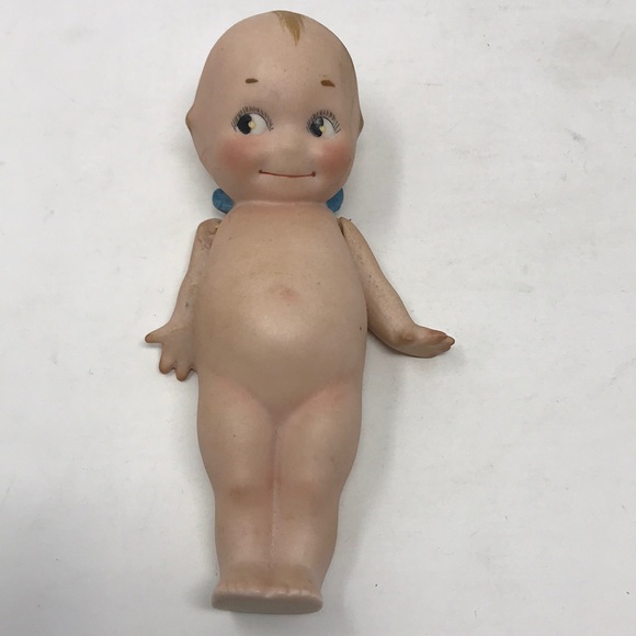 kewpie doll with wings
